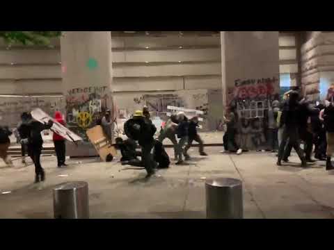 Federal Officers tackle protesters in portland oregon