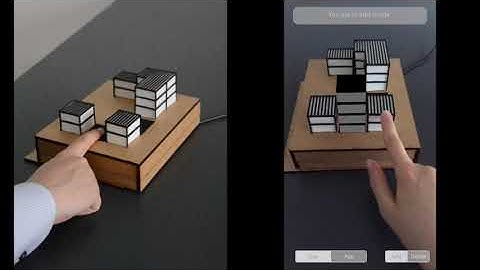Extending AR Interaction through 3D Printed Tangible Interfaces in an Urban Planning Context