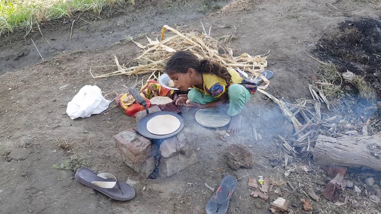 3 year old cooking Indian food making bread outside open field - YouTube