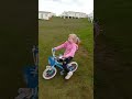Amelia riding a bike