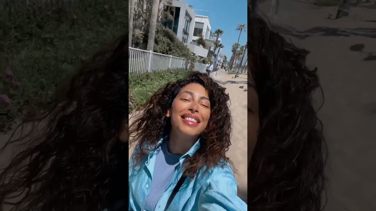 Burts of bright sun. This is Mina El Hammani wearing My Euphoria. 