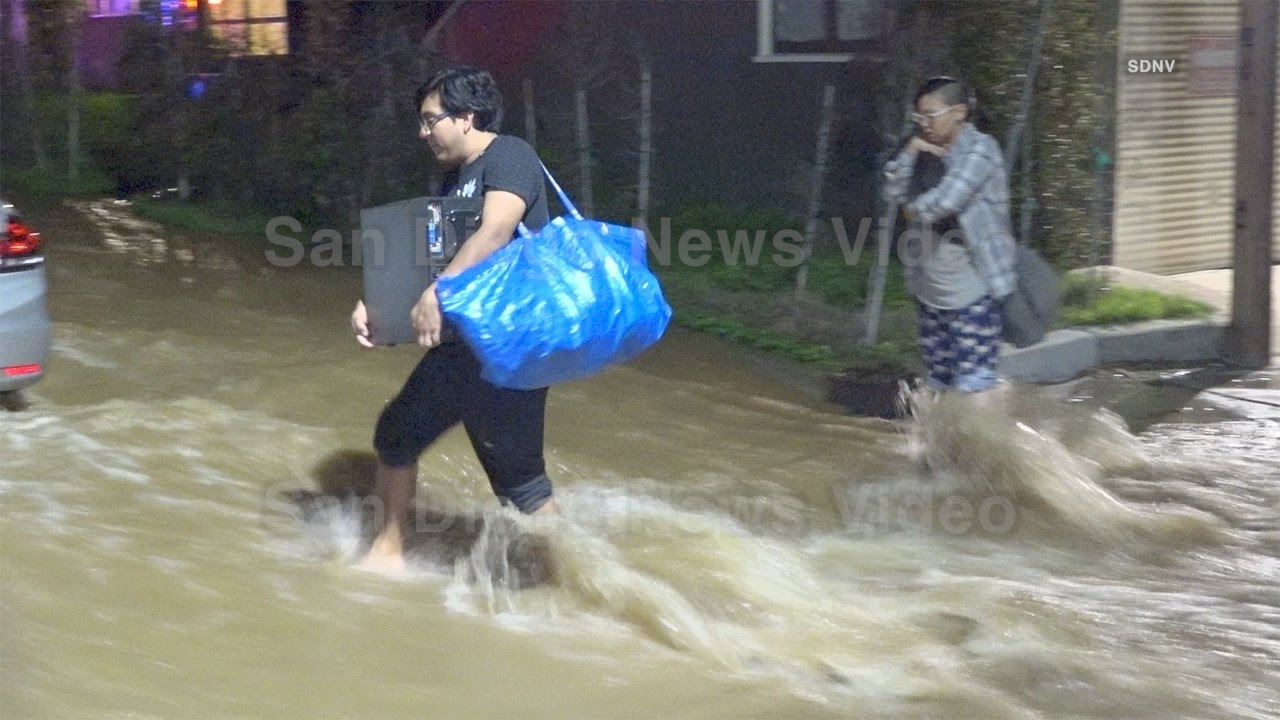 Massive water main break floods streets and homes, North Park - YouTube