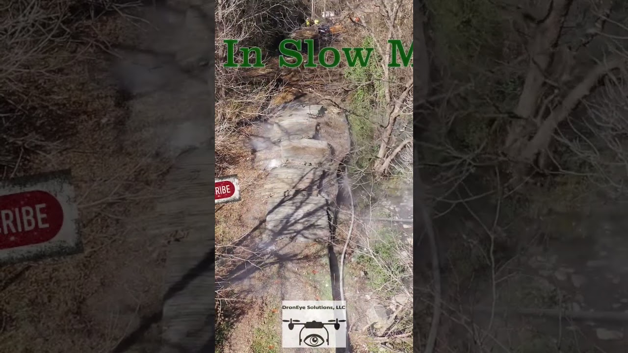 Boom. Aerial Drone view of blasting Dynamite into bedrock for a water line! 