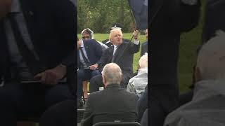 Boris Johnson struggles with umbrella