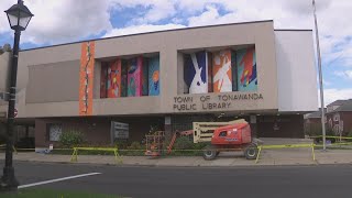 New mural brightens Kenmore Library with community symbols and color