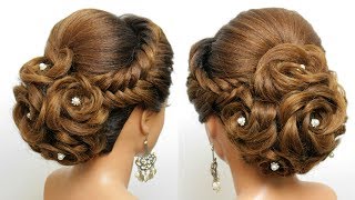 Bridal Hairstyle For Long Hair. Wedding Updo  With Bun Of Braided Flowers
