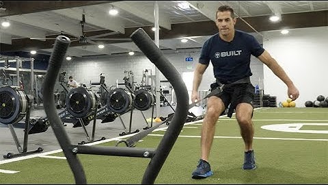 Coach Jason Shows Backward Sled Pull for Stronger Knees