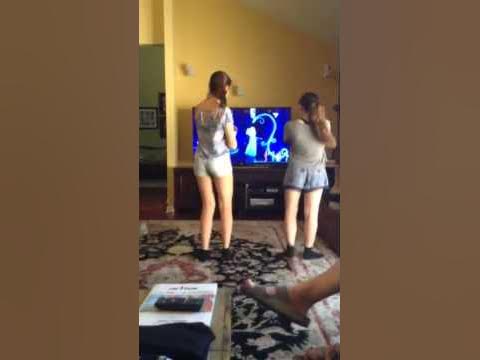 Two teens dancing two a baby song