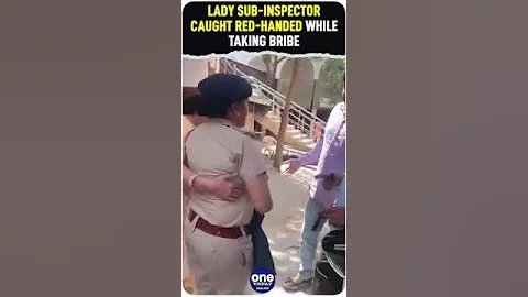 Watch: Female Police Officer caught while taking bribe