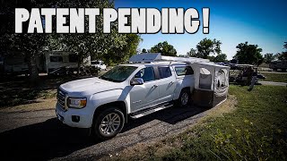 A Truck Camper With A Folding Rooftop Tent Room