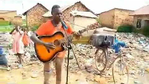 Ugandan boy covers "We got love" by Don Williams