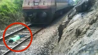 India train stunt: Man risks life lying on railway tracks as train speeds over him