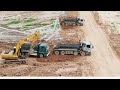 Excavator Digging Dirt and Truck Delivery for Bulldozer Pushing