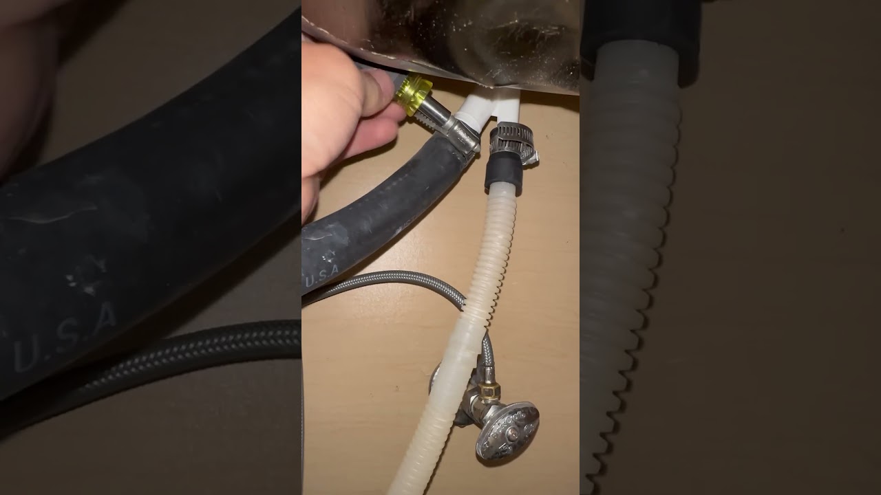 Water leaks above sink when dishwasher runs