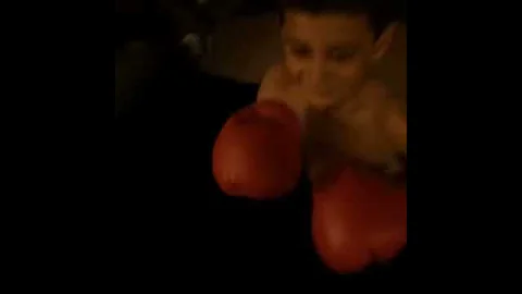 Joshua Godinez first day with gloves 8 years old (...