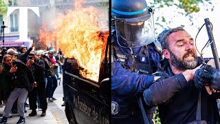 Paris riot: police clash with protesters at May Day march