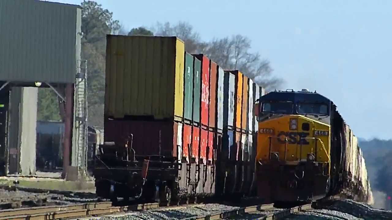 bnsf 5729 CSX Q125 with a pair of 