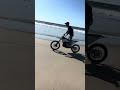 Riding a 80hp stark varg on the beach #stark #starkvarg #wheelie #beach #ebike