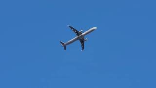 Finnair A321 taking off and diving into the clouds