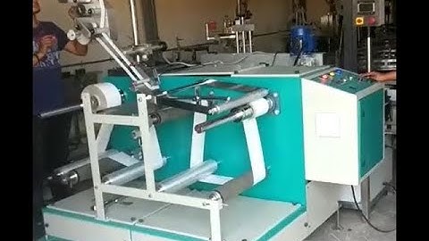 Labeling on Sticker Roll Through Winder Rewinder Machine