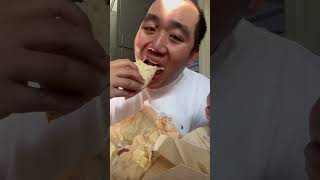 Showing and eating Double Stacked Taco Chalupa Supreme Beefy 5 Layer Burrito and chip from Taco Bell