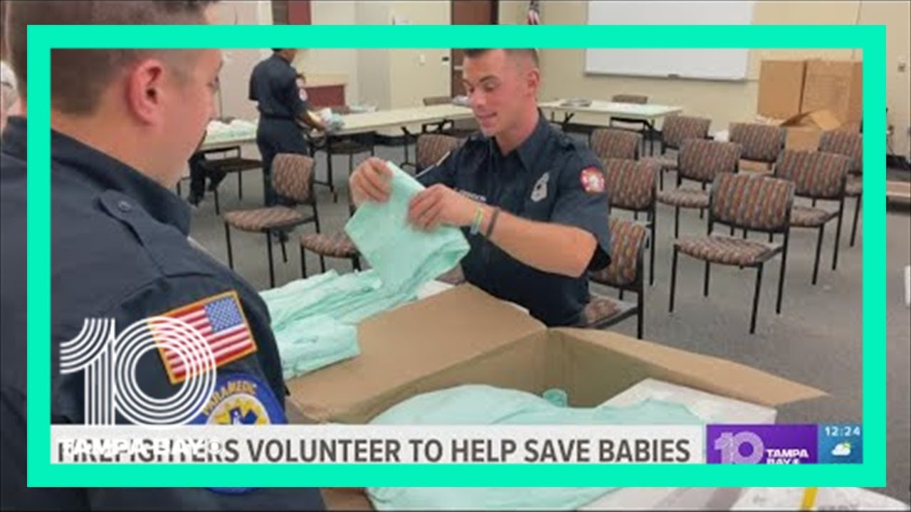 Local firefighters pack bags full of items designed to save babies