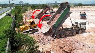Well Done! Dozer Using Potent Energy Pushing Stone Clearing Mud & Land Fill, Trucks Transport Rocks