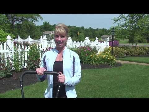 Stacy Walters demonstrates the Push Reel Lawn Mower