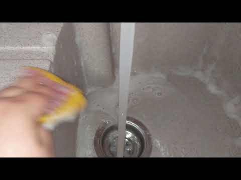 Video: Cum să curățați rapid o chiuvetă din piatră artificială în bucătărie