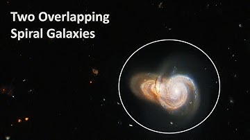 NASA Hubble Space Telescope captures SDSS J115331 and LEDA 2073461, two spiral galaxies that overlap