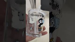 cartoon character penguins glass cup with handle with measurement of water