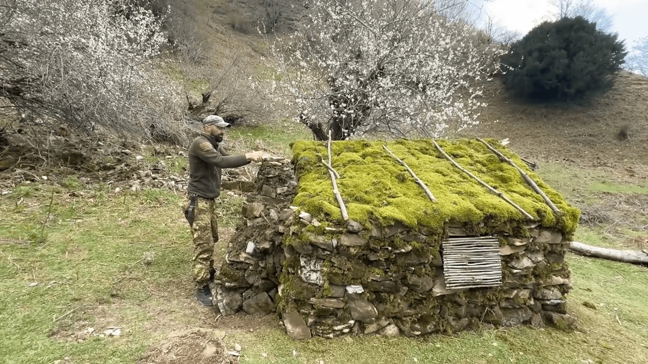 Building a winter campsite with a fireplace inside my survival shelter tent - My Wild Bushcraft Life