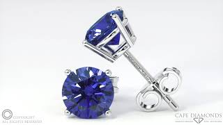 7001. Platinum White Gold 4-Claw Stud Tanzanite Earrings