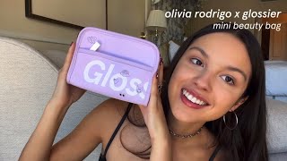Olivia Rodrigo and her Glossier beauty bag
