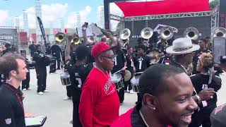 Band marching thru the crowd after an @AtlantaFalcons game