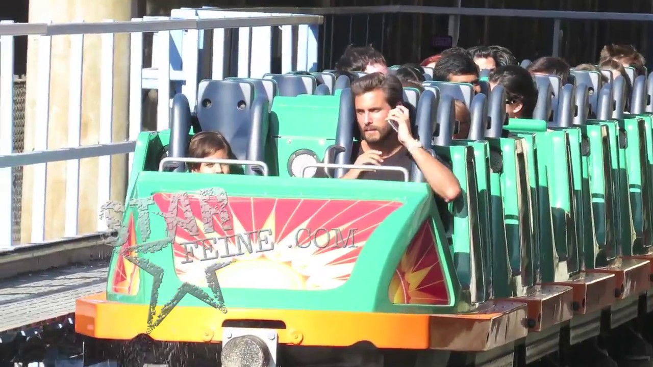 Kanye West and Scott Disick cause a fan frenzy while visiting Disneyland for North West birthday.