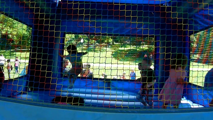 Kids enjoying the "Moon Bounce" at the Charles Village Festival, Wyman Dell Park, Baltimore
