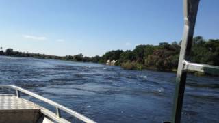 Arriving At Royal Livingstone Hotel By Boat On The Zambezi