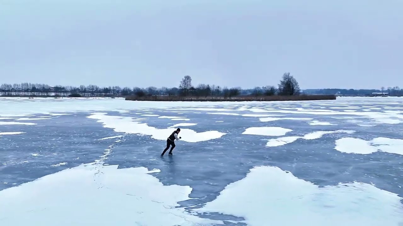 Lukasz Kedzierski frozen lake in Poland ￼