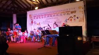 music performance during mid-autumn festival events with decorations at bukit batok east, singapore