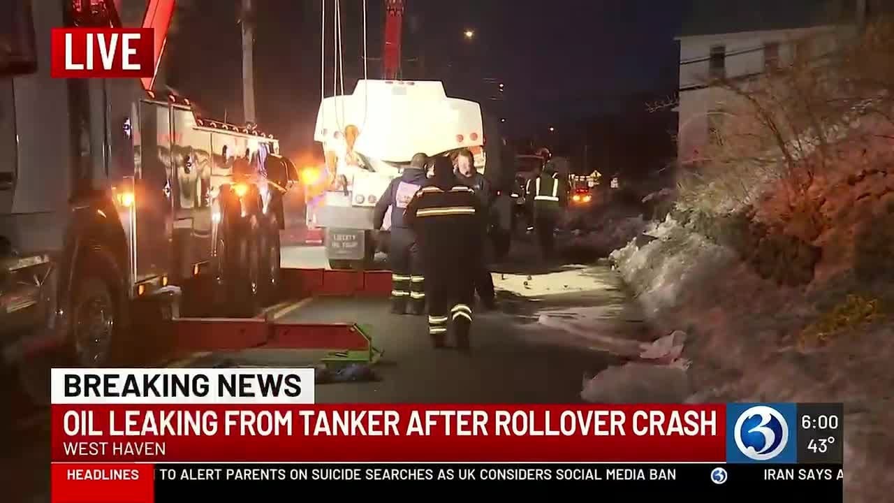 Oil leaking from tanker over rollover crash in West Haven - YouTube