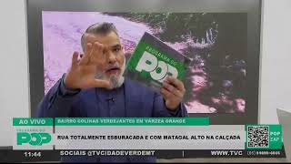 Rua Totalmente Esburacada E Com Matagal Alto Na Calçada No Colinas Verdejantes Em Vg