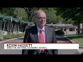 Economy 'hanging in there' as reports show slow growth, rising inflation
