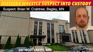 Officers Wrestle Suspect Into Custody At Detroit Lakes Courthouse