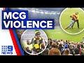Violent scuffle leaves fans injured at MCG during AFL clash | 9 News Australia