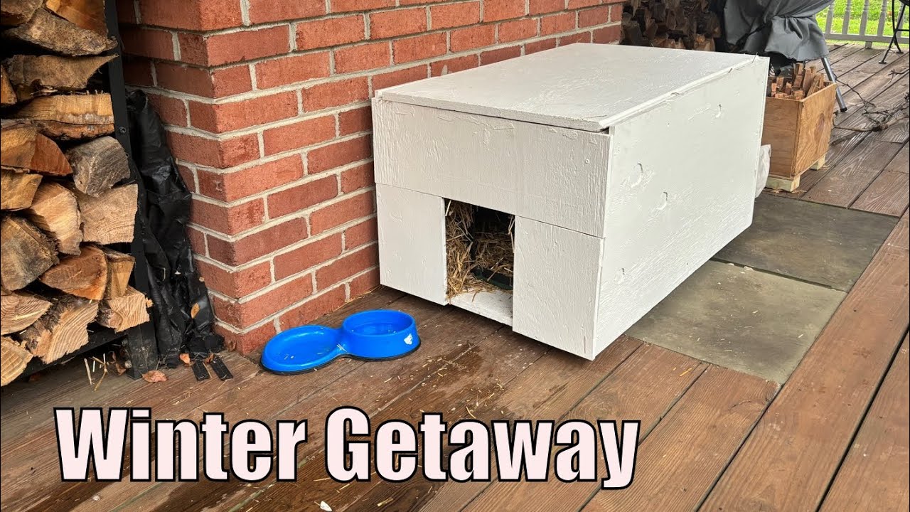 Insulated feral cat shelter with reflective mylar insulation, door flap,  and a built in awning. 