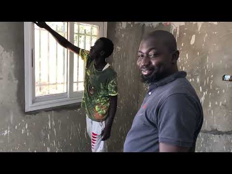 The Arrival installs windows in the tiny house in The Gambia