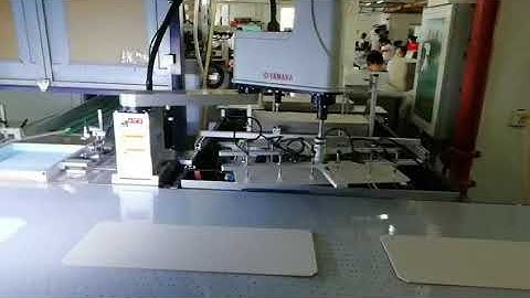 Automatic visual hardcover positioning machine
