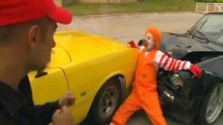 Scene of the fat pizza movie where paulie fights mcdoggle clowns