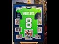 Framing a Football Jersey with 6 Graded Cards